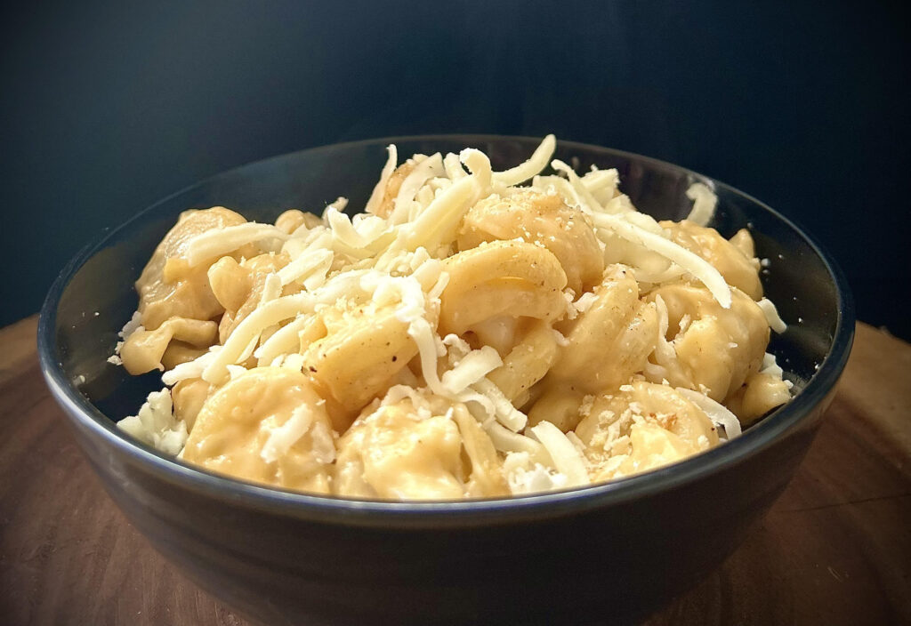 a bowl of pasta and cheese