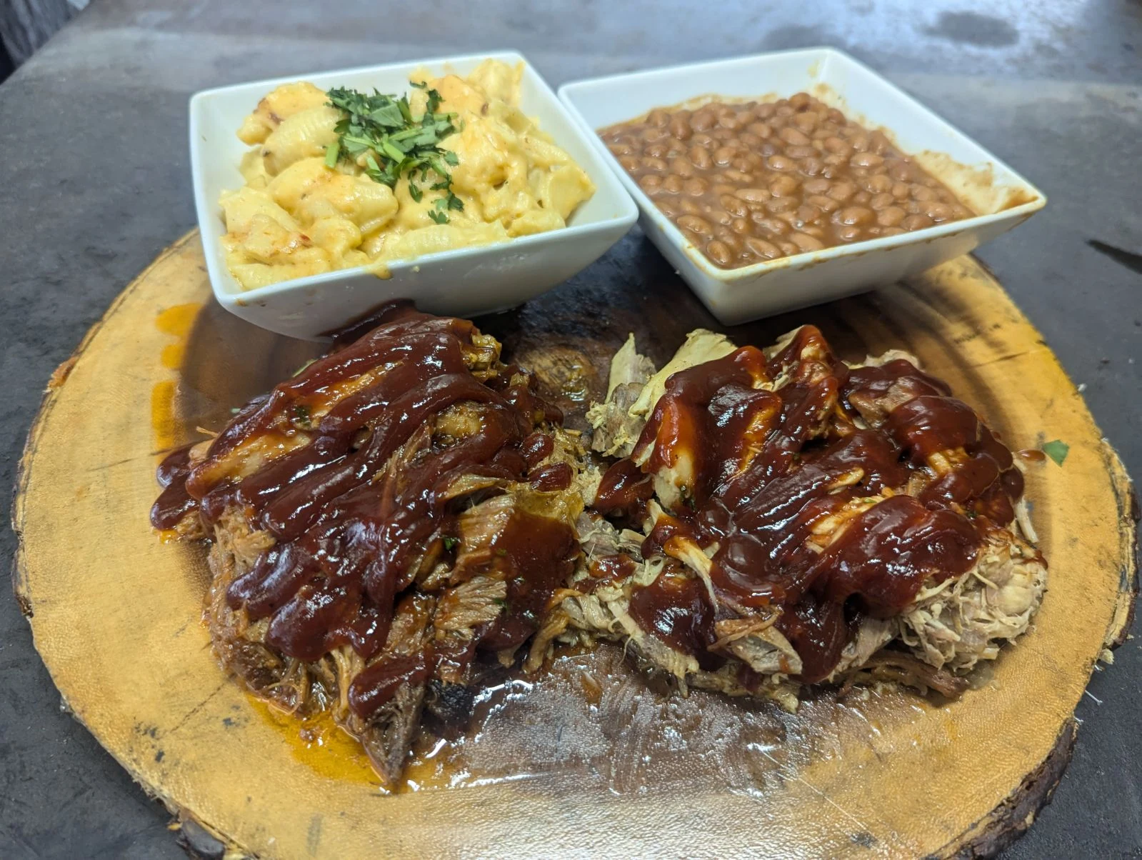 Two meat BBQ plate with sides
